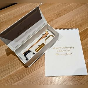 Written Word Beginner Calligraphy Kit plus Uppercase practice pad.